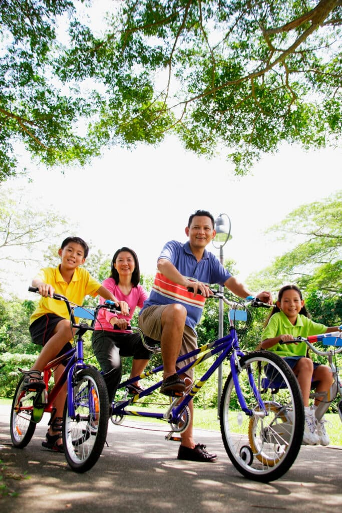 family riding bikes together