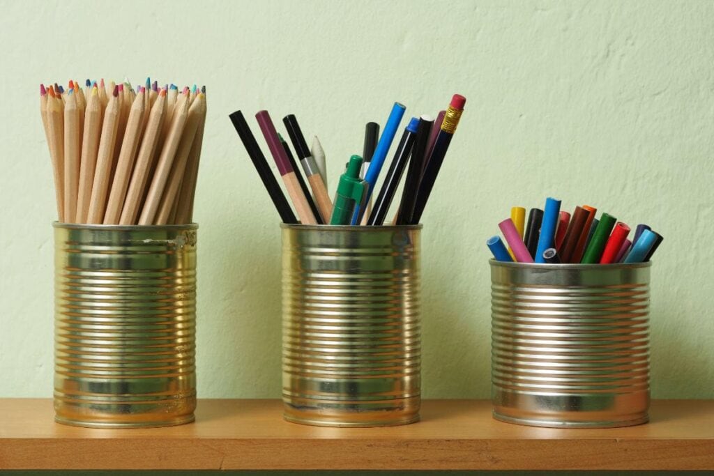 cans used to hold pencils