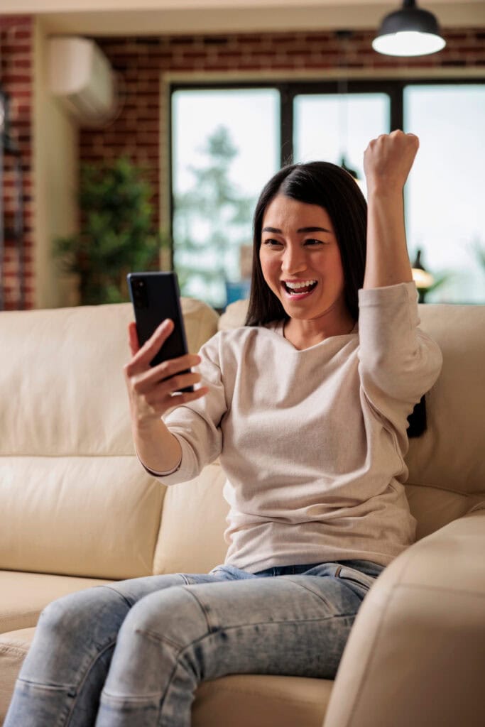 woman playing fun games on her phone