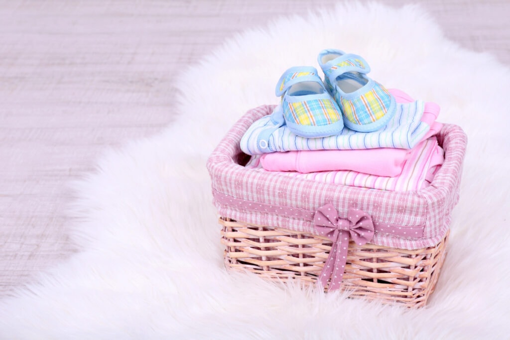 basket with baby gifts inside