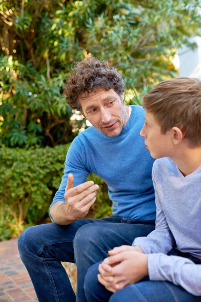 dad and son talking about boundaries