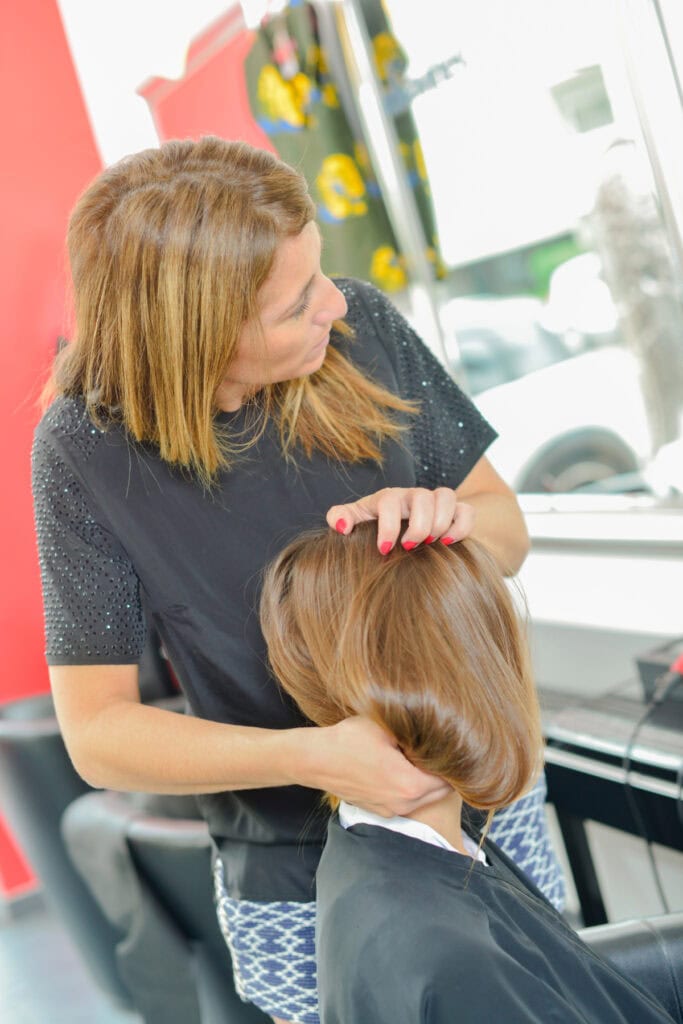 woman getting her hair done