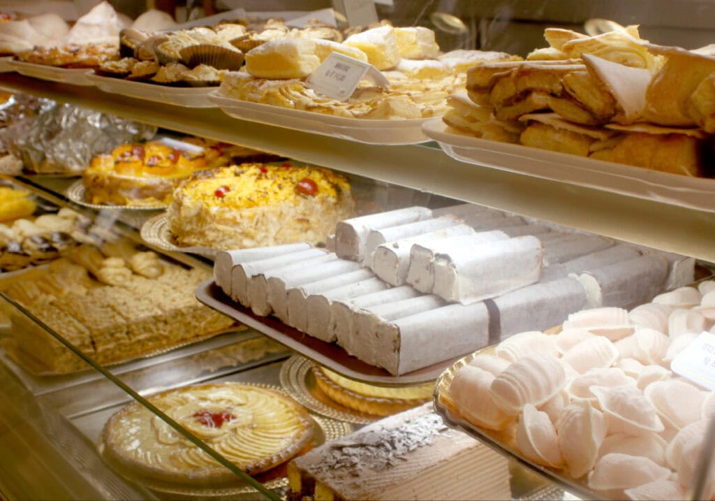 bakery case full of desserts in Europe