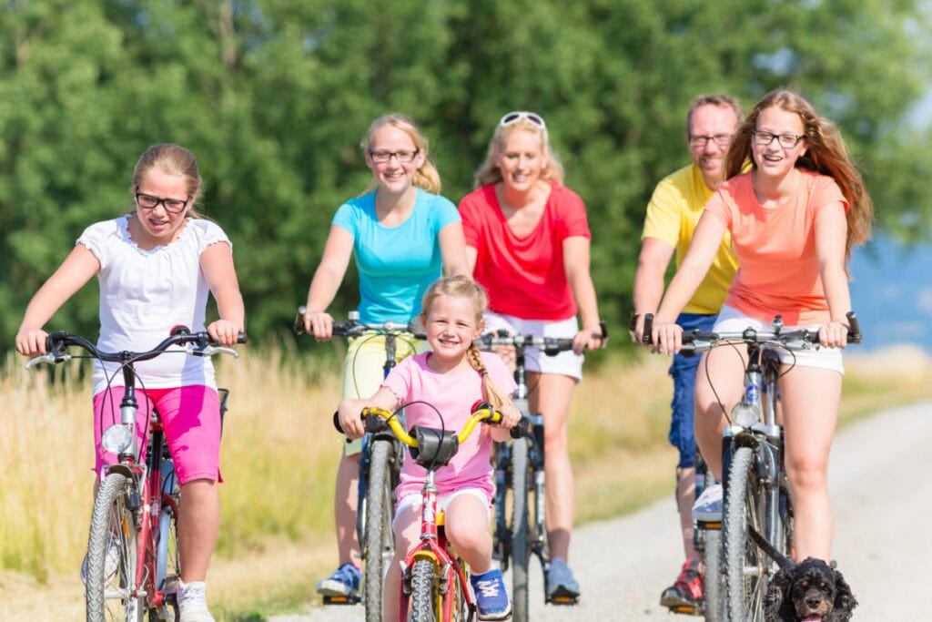 family cycling with kids